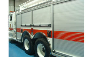 Multiple Gortite roll-up doors on a fire truck